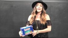Lucy Hale talks lie a little better music video and "Let's Get Her to Camp" campaign