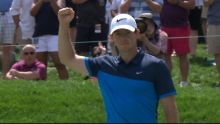 Rory McIlroy holes an impressive putt for birdie at the Memorial