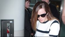 Emma Watson Wears Stripes And Evades Fans At LAX