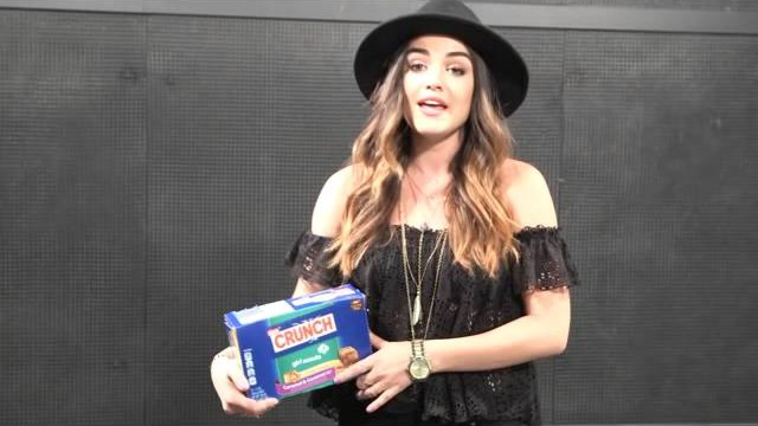 Lucy Hale talks lie a little better music video and "Let's Get Her to Camp" campaign
