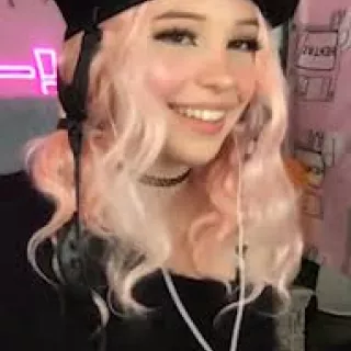 Belle Delphine's short purple and pink sweater on her Instagram
