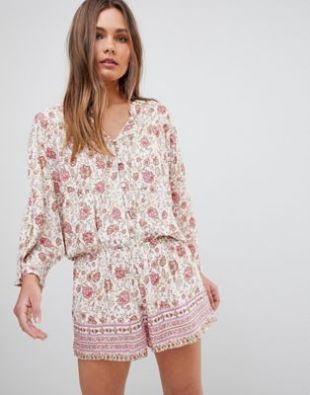Combishort avec boutons aux manches