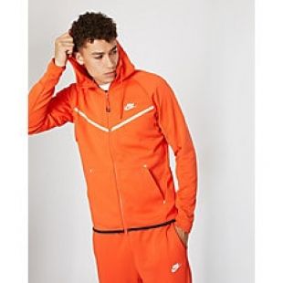 orange nike tech suit
