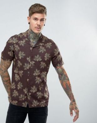 ASOS DESIGN regular fit viscose shirt with leaf print and revere collar at asos.com