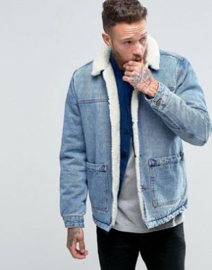 ASOS DESIGN borg lined denim jacket in blue wash at asos.com