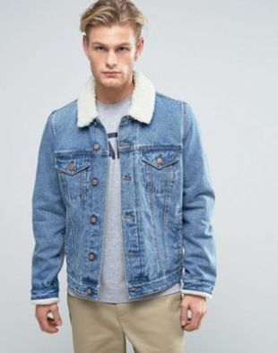 ASOS DESIGN   Veste en jean avec col en imitation peau de mouton à délavage moyen at asos.com
