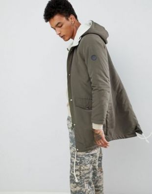 Criminal Damage parka jacket in khaki with fleece hood at asos.com