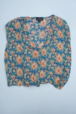 Style vintage pré aimé vert, bleu et abricot chemise sans manches bouton up des femmes imprimé floral avec noué au dos