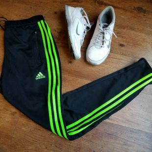 black and neon green adidas pants