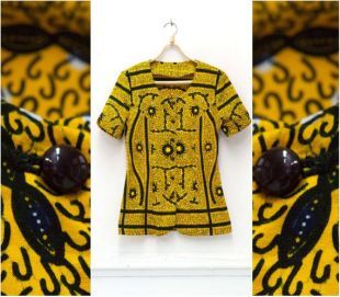 des années 70 jaune coton imprimé africain noir chemisier S M Afro chemisier à manches courtes Funky de femme africaine Blouse Tribal rétro bouton en haut en haut