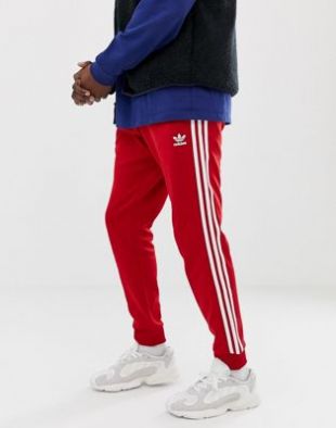 adidas Originals DV1534 Pantalon de jogging ajusté à 3 bandes resserré aux chevilles en Rouge