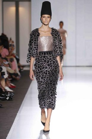 Ralph & Russo Black and rose gold cocktail dress featuring a crystal embellished bodice and cropped jacket adorned with feather and crystal chain discs