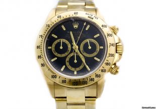 Rolex yellow gold daytona