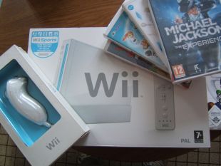 Lot Console WII + manette + volant + 4 jeux - le tout neuf