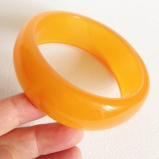 Bracelet   chunky funky translucide orange lucite bracelet en plastique design rétro