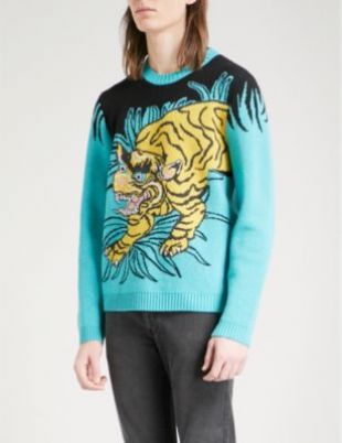 Gucci Tiger intarsia wool jumper worn by Andre 'Dre' Johnson