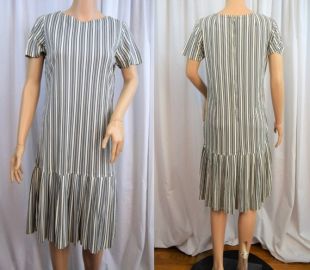Vintage 1960s black and white nylon knit dress with dropped waist