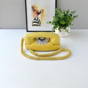 Téléphone à cadran rotatif en jaune