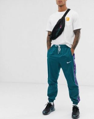 Nike - Pantalon de jogging avec bande logo - Vert | ASOS