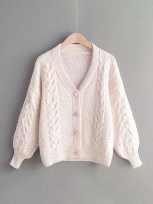 Pull unicolore avec boutons