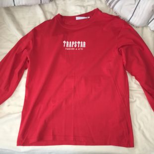 red long sleeve with anime printing on the sleeves and back