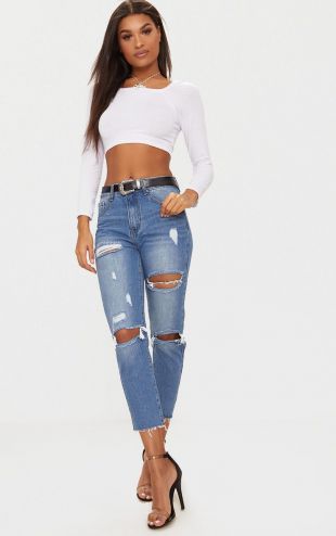 Jean boyfriend délavé et déchiré aux cuisses