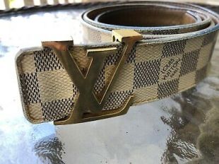 Louis Vuitton white and gray check belt worn by Blueface as seen