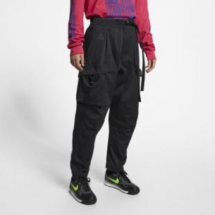 The cargo pants in black worn by Tonton Gibs in TRAVIS SCOTT X AIR