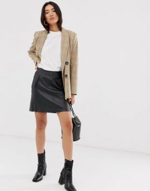 Selected Femme - Mini-jupe en cuir ave poches - Noir | ASOS