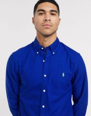Polo Ralph Lauren - Chemise Oxford coupe slim teinte en pièce avec logo - Bleu vif | ASOS