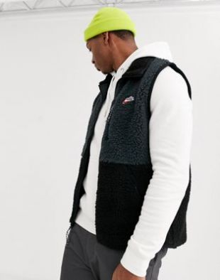 Nike winter fleece gilet in black | ASOS