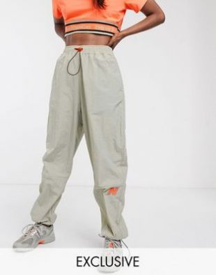 New Balance Utility Pack cargo trousers in beige exclusive at ASOS | ASOS