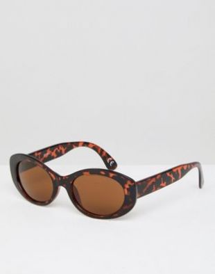 Lunettes de soleil ovales en écaille de tortue avec verres marron