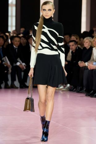 The black sweater and white Dior 