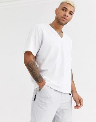 ASOS DESIGN - T-shirt oversize avec col V profond - Blanc | ASOS