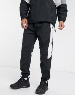 Nike - Jogger tissé color block resserré aux chevilles - Noir | ASOS