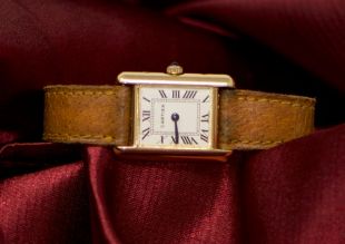 Cartier Tank 18KT Yellow Gold Wristwatch with 18 KT Yellow Gold Deployant. Vintage Cartier Tank in very Mint condition