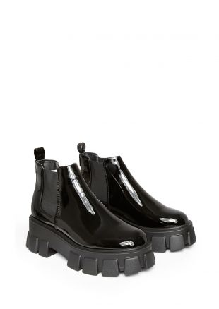 easton chunky sole ankle chelsea boot in black faux leather