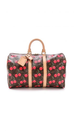 Louis Vuitton Monogram Cerises Keepall Bag worn by Bella Hadid New