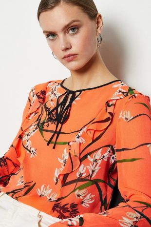 Orange Floral blouse worn by Agatha Raisin (Ashley Jensen) in