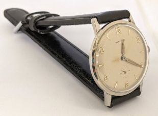 Les années 1960 Hamilton 676 Stainless Steel Mens Wrist Watch Keeps Time (fr) Bande de NOS 33mm Affaire ronde (en anglais seulement) 22306