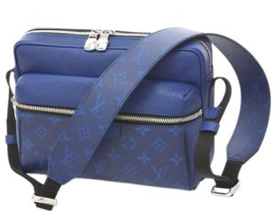 The blue bag Louis Vuitton monogram worn by Aitch on his account Instagram  @aitch
