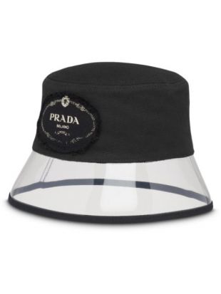 Prada plexiglass trim bucket hat in black worn by Kylie Jenner on her  Instagram account @kyliejenner | Spotern