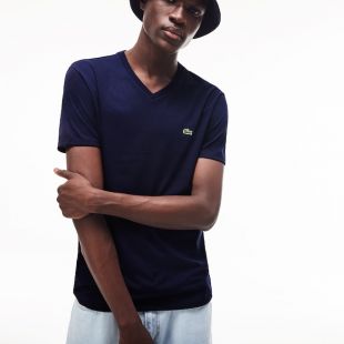 The t shirt V neck blue Lacoste Cyril F raud in Show Must Go Home