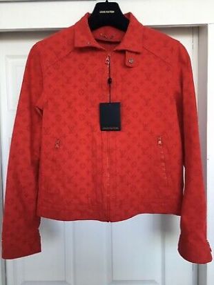 The jean jacket red Louis Vuitton worn by Lil Baby in her video