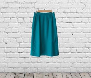 Jupe vintage, Bleu Vert, Era des années 80, Taille 10: Une jupe turquoise minimaliste mignonne de longueur moyenne avec des poches et une taille de 26 pouces