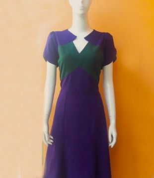 Purple And Green Dress Of Peggy Carter Hayley Atwell In Marvel S Agent Carter Season 2 Spotern
