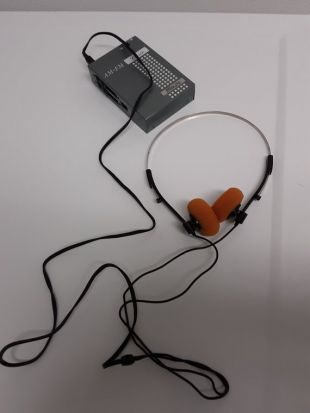 Starlite AM/FM radio walkman avec casque orange original.  Fabriqué à Hong Kong en 1988