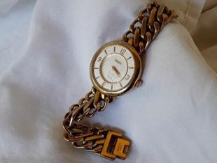 vintage Nineties Gold Tone Verscace VERSUS Round Bracelet Style Watch with Lion Face Background / Stainless Steel vintage Nineties Gold Tone Verscace VERSUS Round Bracelet Style Watch with Lion Face Background / Stainless Steel vintage Nineties Gold Tone 