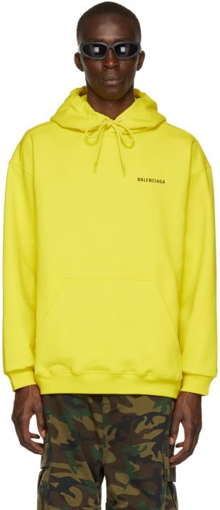 Balenciaga Logo Hoodie in Yellow worn by Kian Parsa Moayed) as seen in Love Life Tv series outfits (S02E02) | Spotern